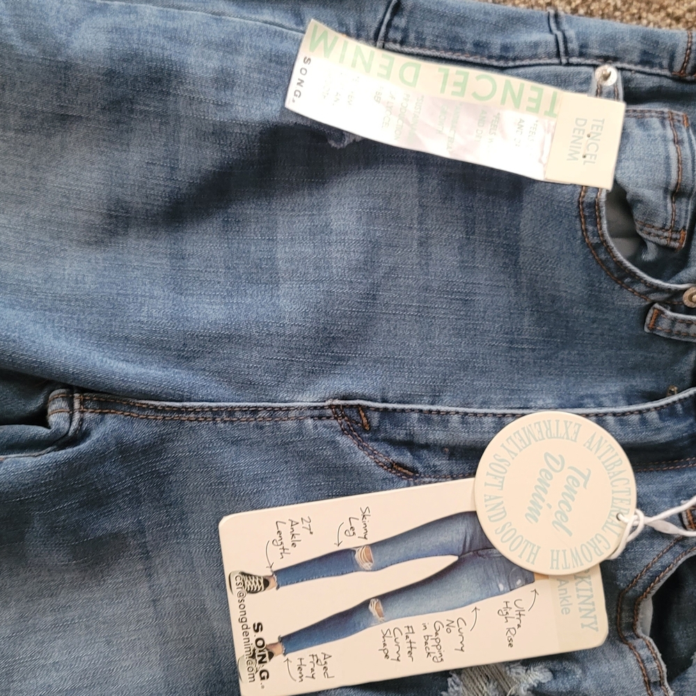 Blue Skinny Jeans with Distressed Details